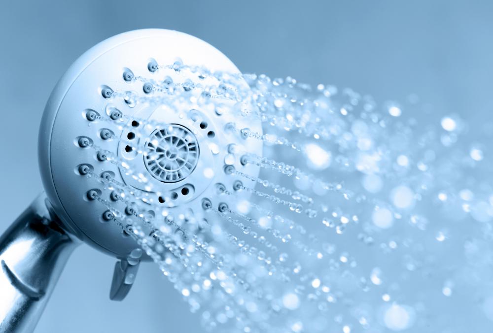 Enema supplies are connected to a shower for a shower enema.