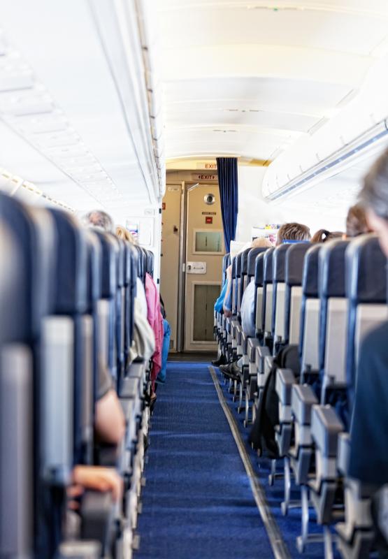 Walking during a plane flight is encouraged for people at risk of developing an embolism.