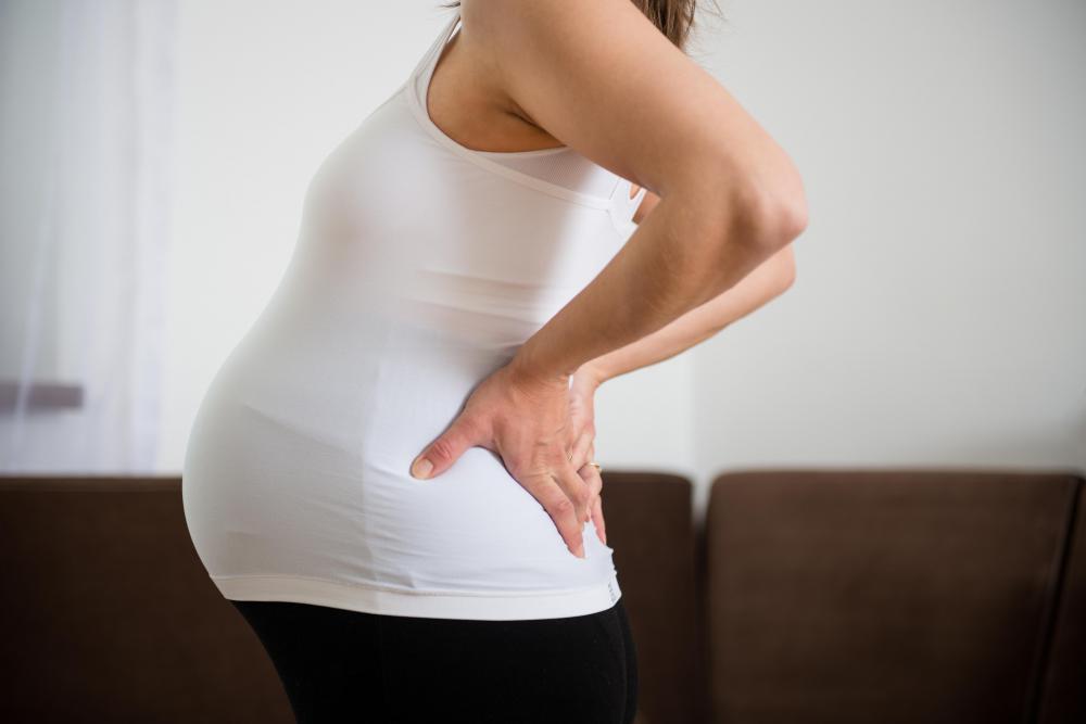 Pregnancy may cause both back pain and nausea.