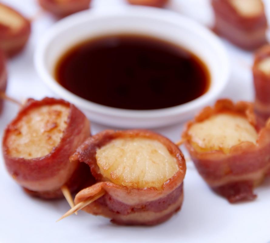 Broiled, bacon-wrapped scallops.