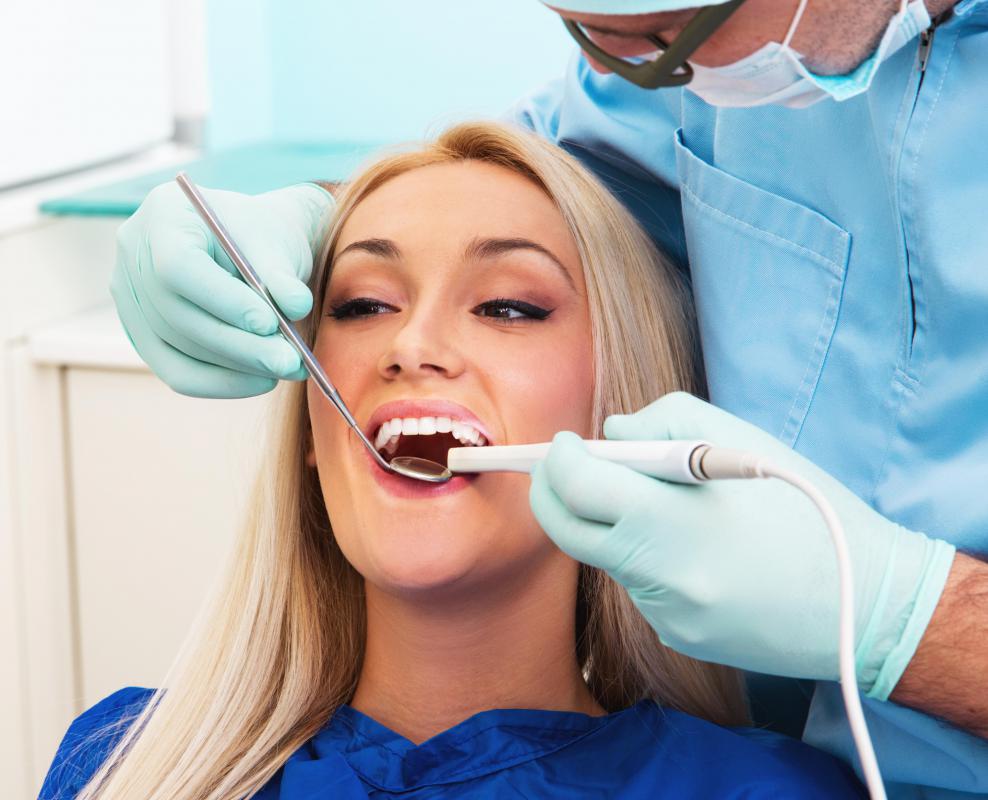 A topical anesthetic may be applied before a dental procedure.