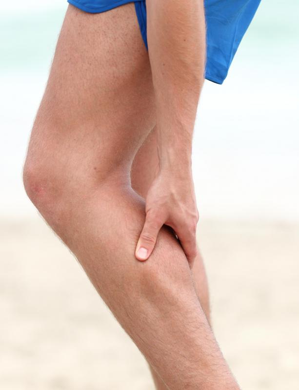 A man with a leg cramp.