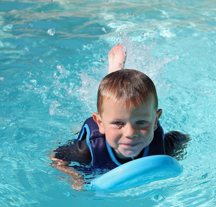 Swimming kickboards are common when children are learning to swim.