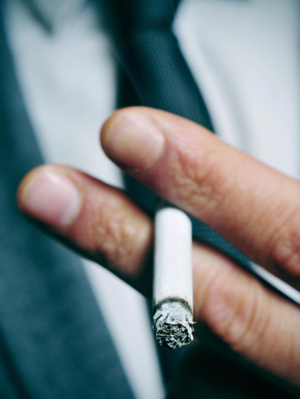 Avoiding smoking may help prevent tight dry skin.