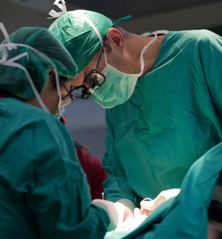 Surgeons create a shunt to compensate for a patient's heart defect.