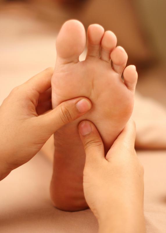 A foot massage may help treat toe spasms.