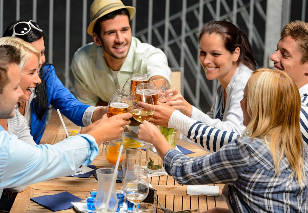 A friendly demeanor and a round of drinks can help a circle of friends get along during the holidays.