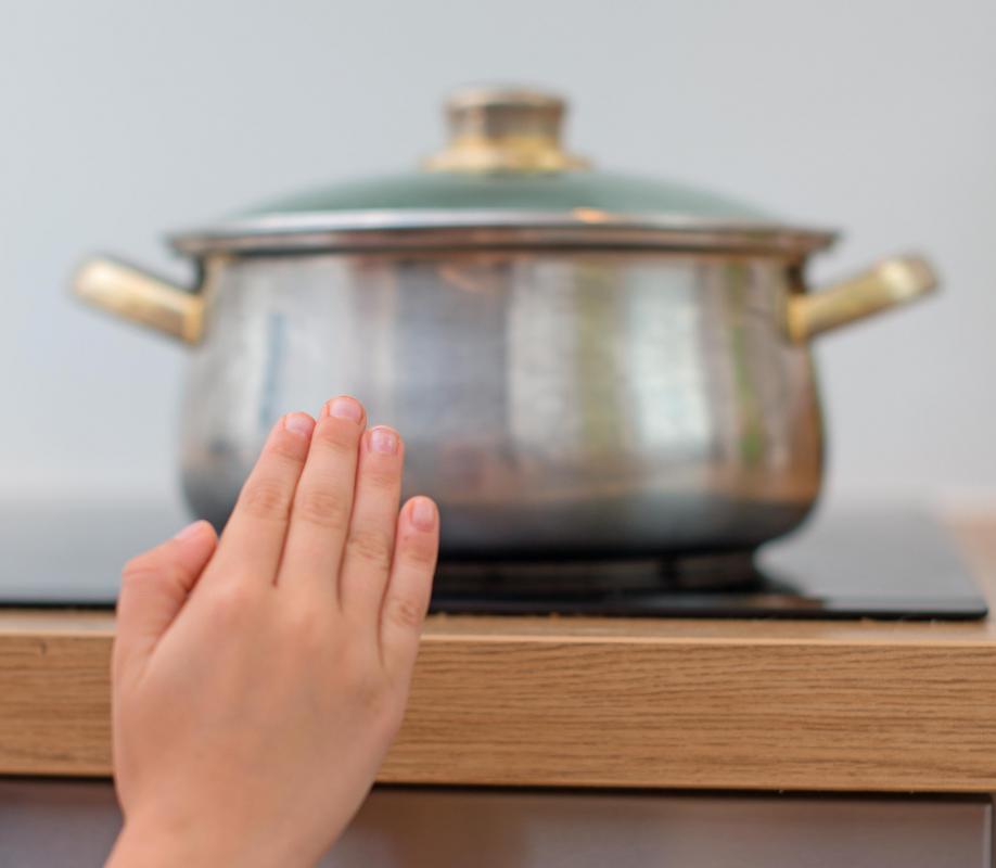 The nervous system is responsible for the body's response when touching a hot object.