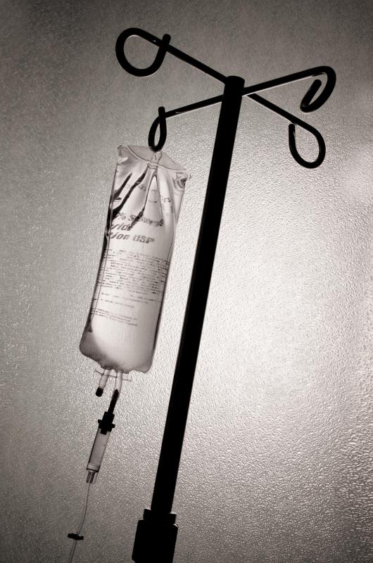 Hanging IV bag of saline solution.