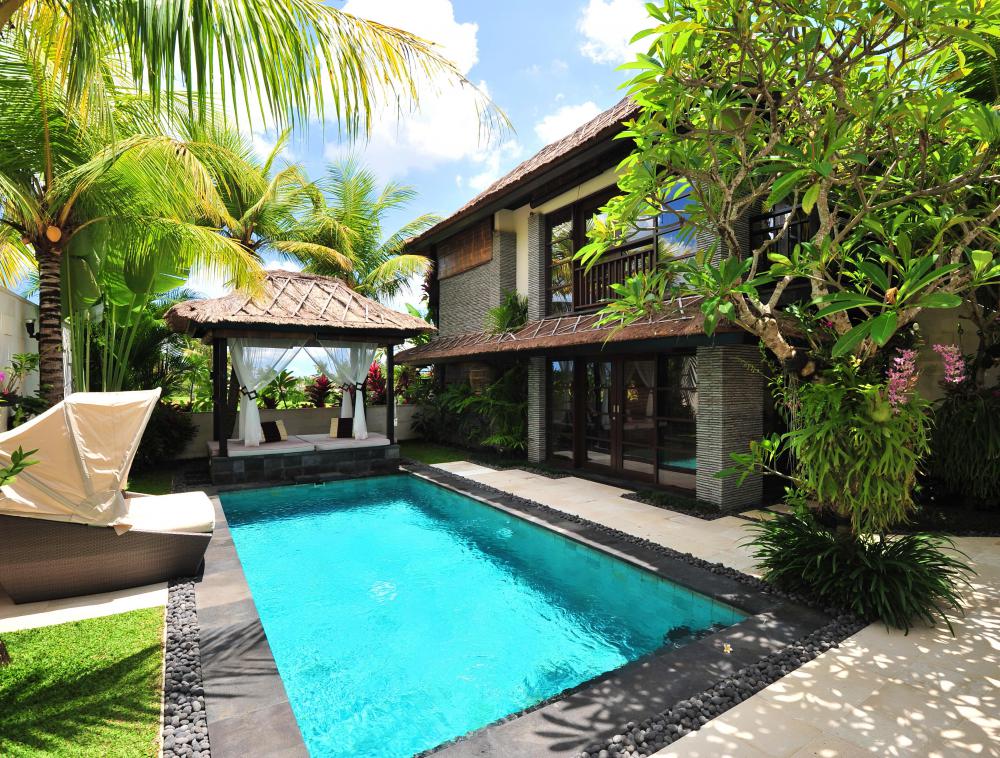 Architects design beautiful lap pools into client's landscaping.