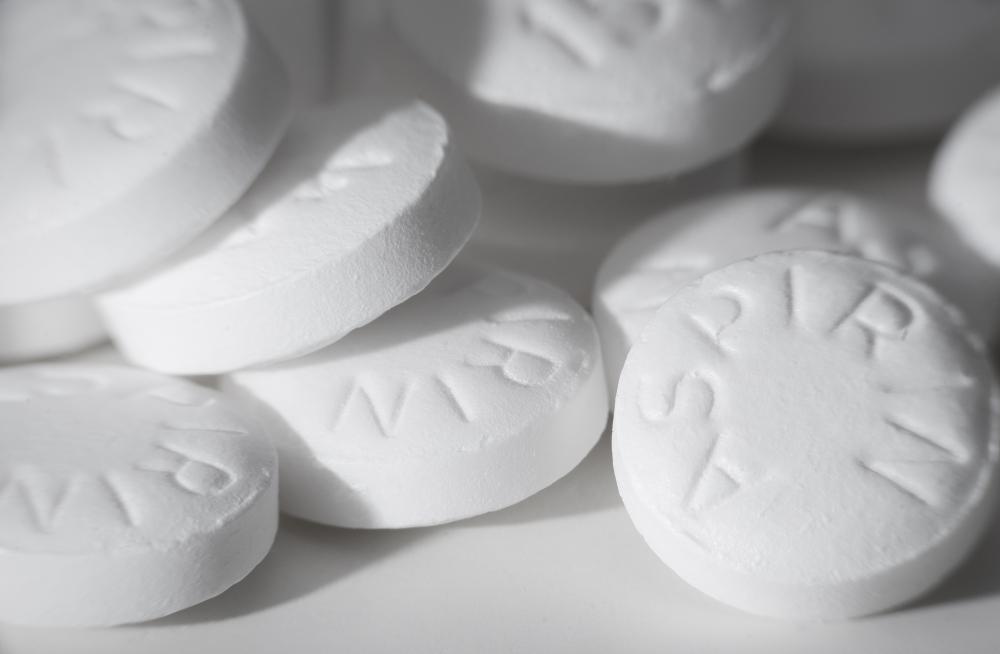 High doses of aspirin may cause bleeding ulcers.