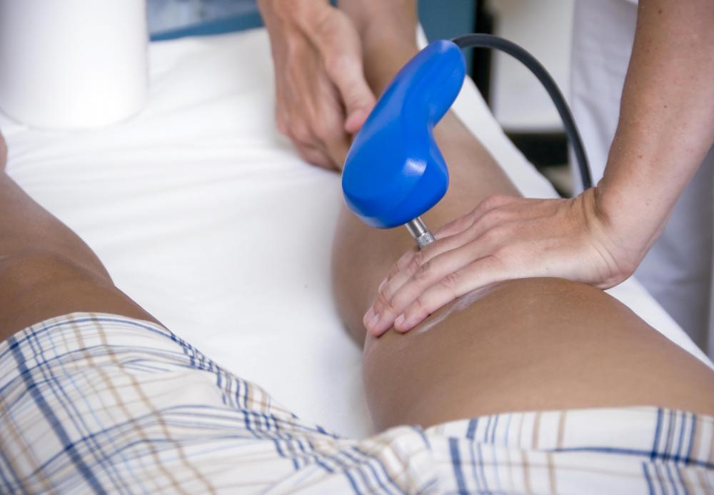 A low intensity laser is used during cold laser therapy to reduce pain and inflammation on a patient's body.