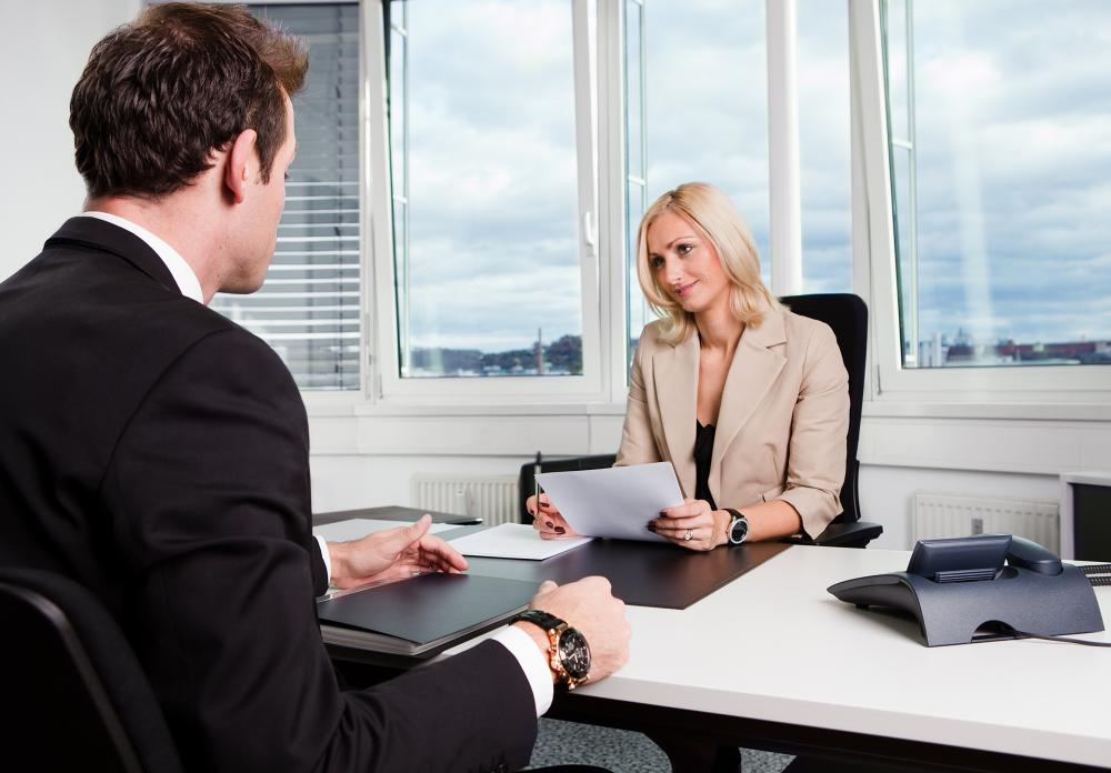 A manager in a meeting with an employee.