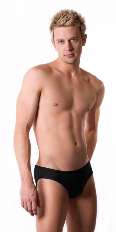 For a male, a 'swimmer's build' usually implies a flat, narrow chest.
