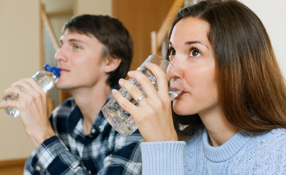 Drinking large amounts of fluids and delaying urination for as long as possible may be one way of gradually treating bladder capacity problems.