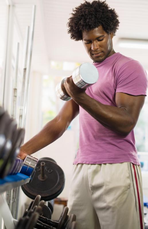 Lifting weights may be part of a combat fitness training program.
