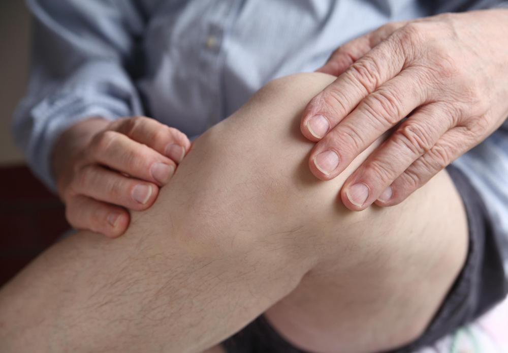In a hinge joint, like the knee, the cylindrical head of one bone fits into the socket of the other bone.