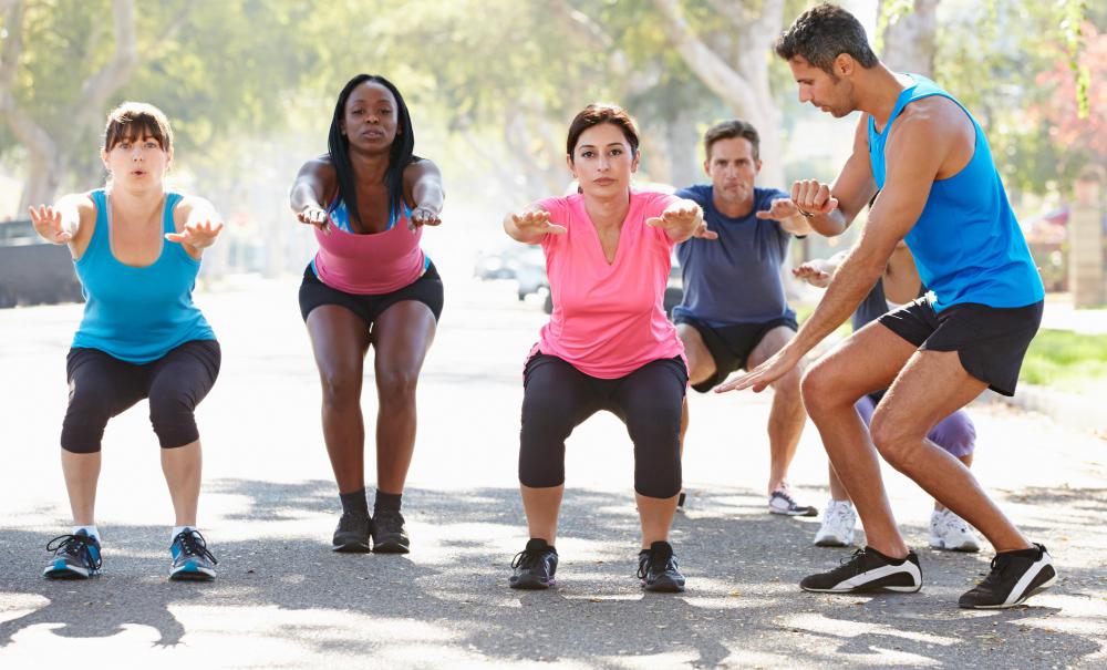 Squats target the thighs, hips, and buttocks.