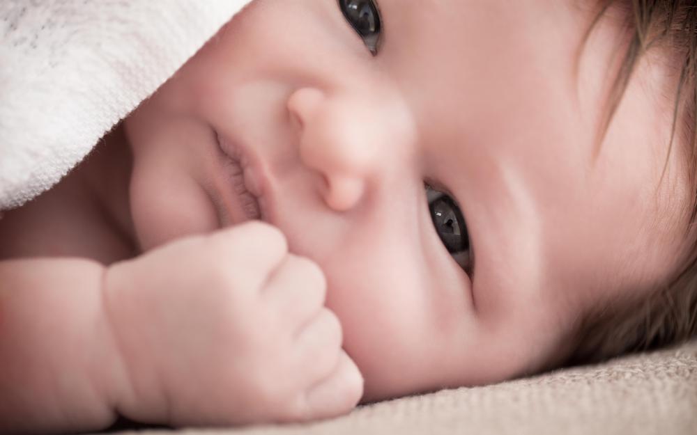 Babies born with ambiguous genitalia may have an incomplete form of testicular feminization.