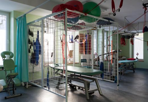Physiotherapists use orthopedic machinery to rehabilitate their patients.