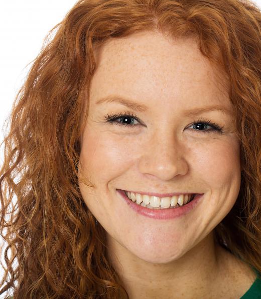 People with red hair often have fair skin and freckles.
