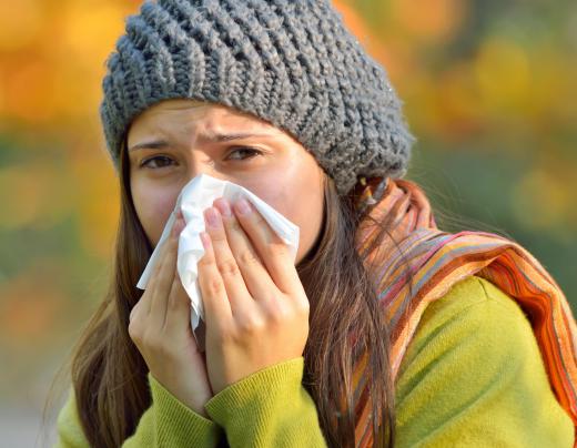 Rib pain that worsens upon sneezing may be a sign of bruised or cracked ribs.