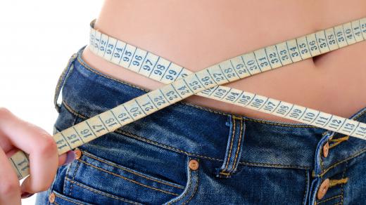 Well-toned deltoids from doing lateral raises can make a person's waistline appear smaller.