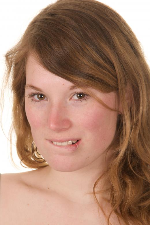 Biting one's lip is a common form of dermatophagia.