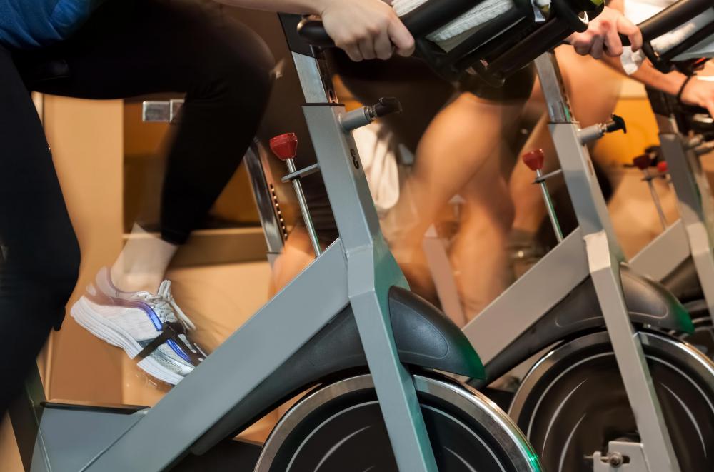 Indoor cycles are employed in spinning classes.
