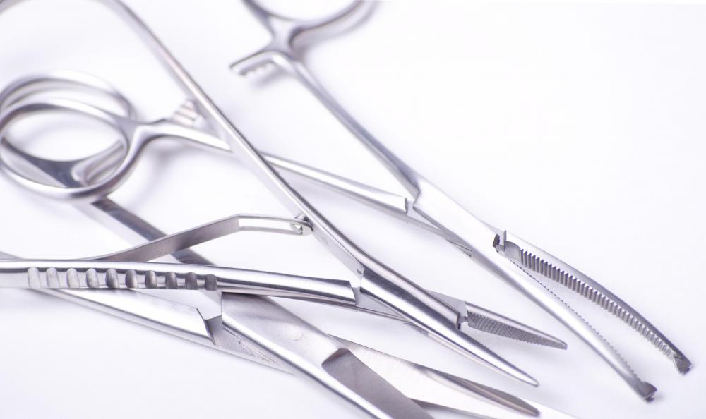 Surgical scissors may be used to remove eyelid warts.