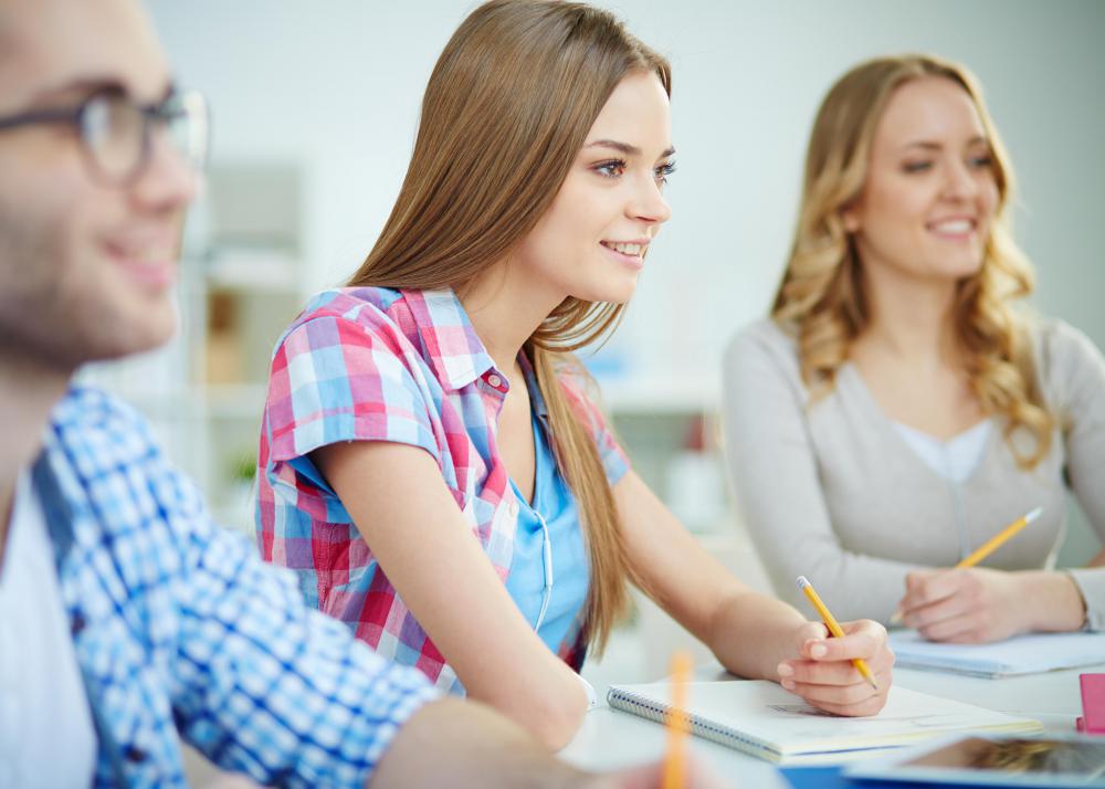 People may produce speech in response to prompts in a classroom.