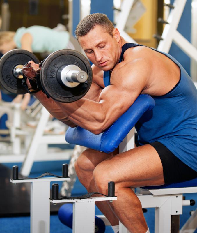 An angled platform is used in a preacher curl.