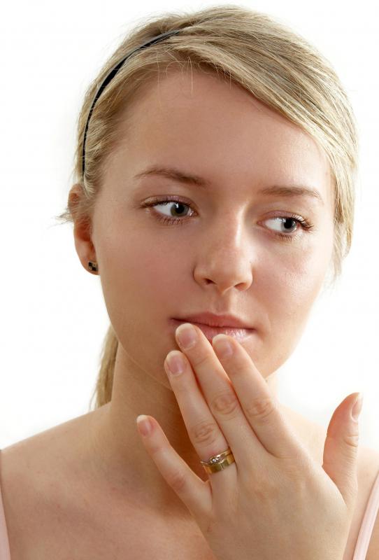 Physicians may prescribe ointment containing salicylic acid to treat lip warts.