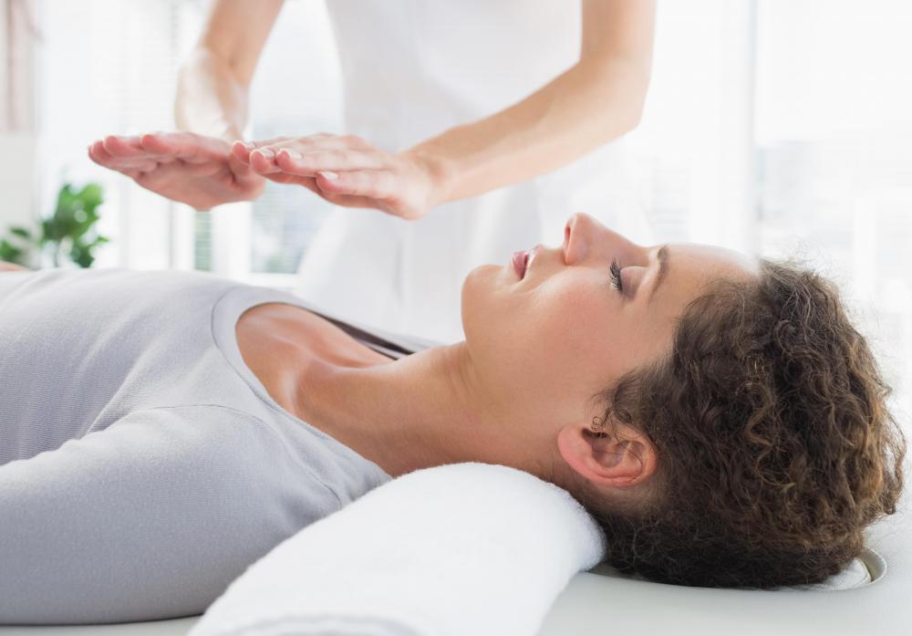 Reiki therapy involves visualizing the energy field around the body and working within this field without actually touching the client.