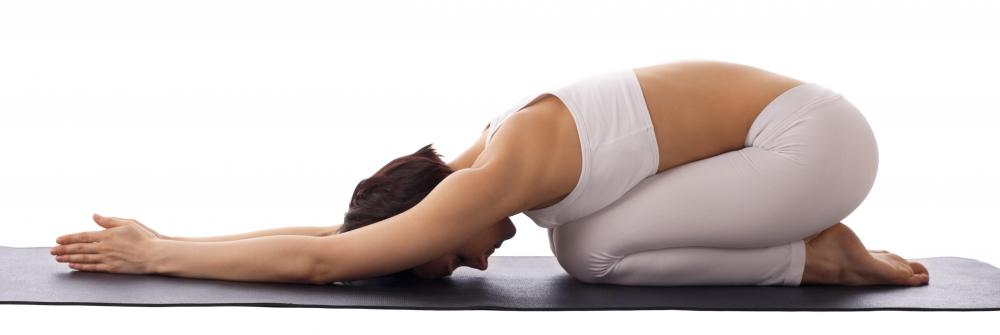 A woman doing yoga.
