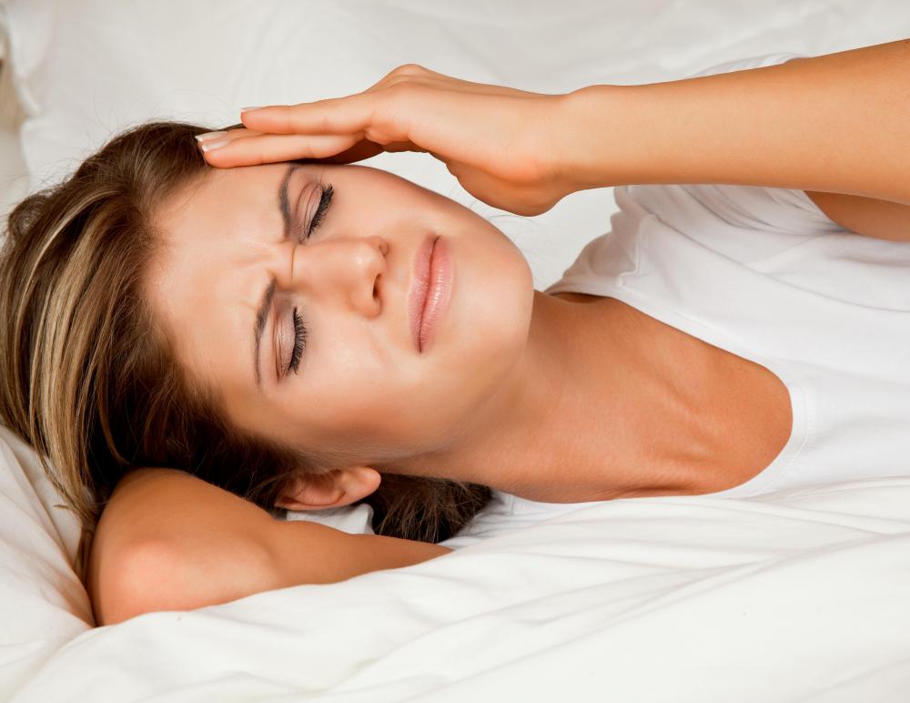 A headache is one of the most common symptoms of a carpet allergy.
