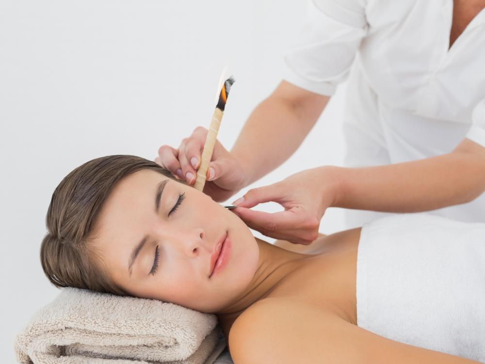 Warm water can be used to loosen ear wax during a flushing procedure.