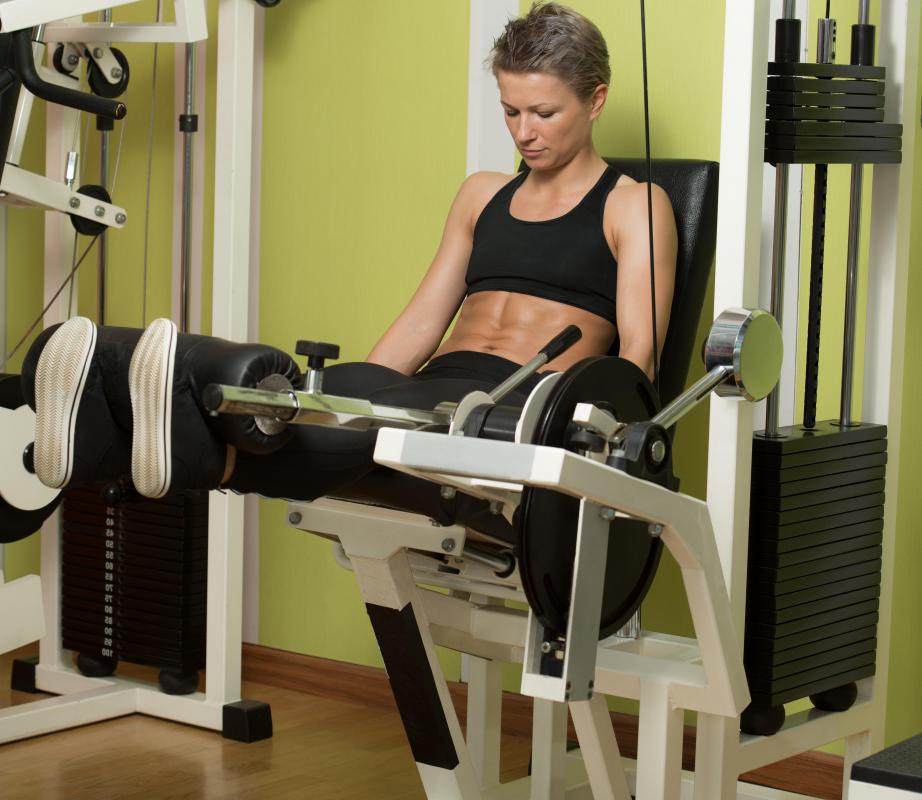 Leg extension machines allow users to exercise their quadriceps, or thigh muscles.