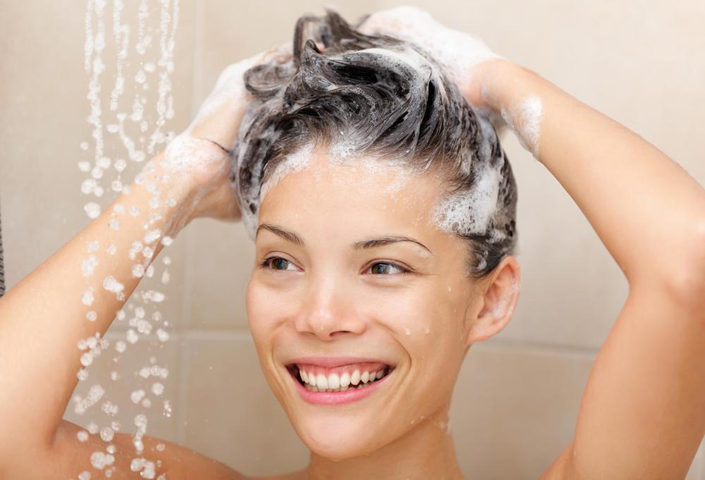 Infrequent hair washing may cause some people to have oily hair.