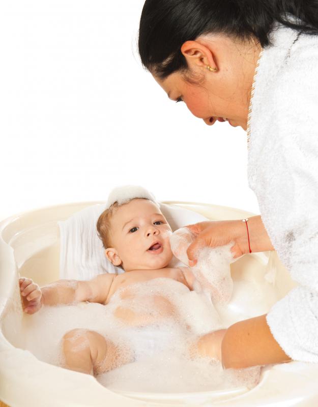 Baby oil can be added to a bath to moisturize dry skin.
