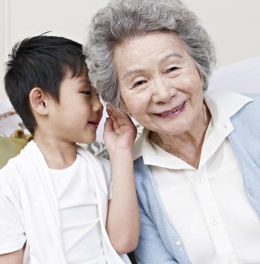 Before the widespread use of hearing aids, seniors may have used an ear trumpet to participate in conversations.