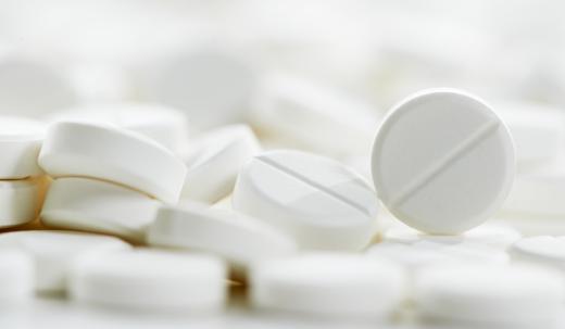 Warfarin may be combined with aspirin for treatment therapy involving a myocardial infarction.