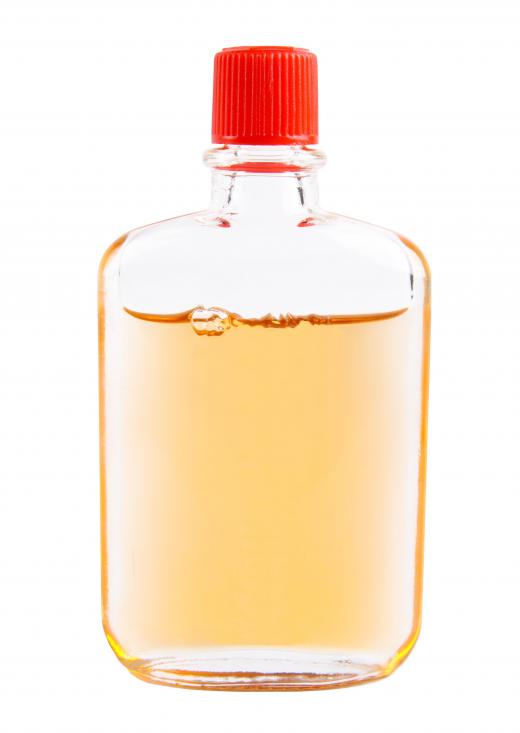 A bottle of safflower oil, which can increase HDL and lower LDL.