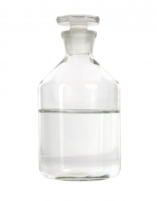 A glass bottle of isopropyl alcohol.