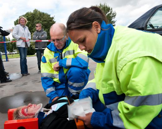 Patients with suspected head or neck injuries are placed on a backboard by level 2 or 3 EMTs.