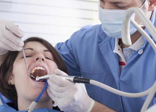 Before attaching the prosthesis permanently, a dentist must prepare the tooth by removing any decaying tissue.