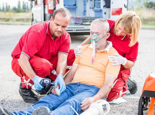 An EMT may manage a patient's wounds, take vital signs, and perform a physical examination of a patient on the way to the hospital.