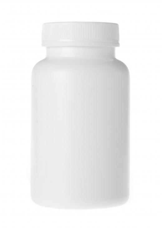 A bottle of OTC painkillers, which can help with sinus and jaw pain.