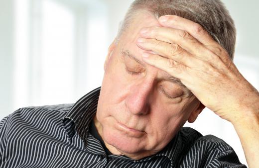 Elderly people experiencing headaches associated with a possible guaifenesin and codeine overdose should seek medical attention immediately.