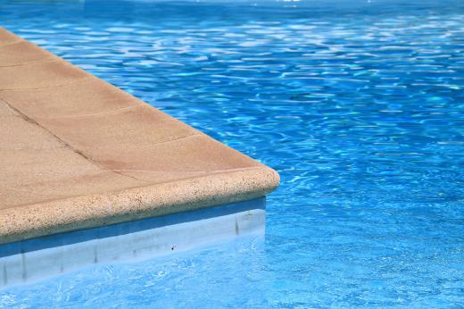 The water in swimming pools is treated with chlorine, which acts as a disinfectant.